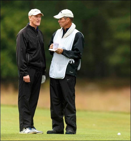 Tom Brandes with caddie Pat O'Donnell discuss a shot during the final match. O'Donnell, of Happy Valley, Ore., had won the PNGA Men's Senior Team Championship a couple weeks ago, and had competed with (and against) Brandes many times in the PNGA Cup and other regional championships.     <em>(Photo copyright USGA/Chris Keane)</em>