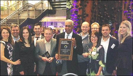 From left to right: Heidi Wills (Executive Director), Patrick DiStefano (volunteer), Deborah Juarez (Board Member), Evan Johnsen (Program Director), John Bianchi (volunteer), Richard Collins (holding the award, Board Member), Casey Jacox (Board Member), Bob Bracht (Board Member), Maureen Atkins (Board Member), Ben Garrett (Board Member) and Shelby Lanting (Events and Volunteer Director)