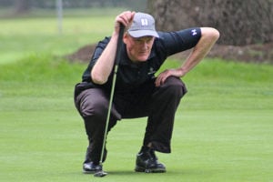 Brandes lines up a putt on Hole 18 during the final round.