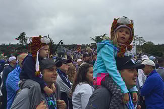 Young fans with Tiger hats enjoy the action