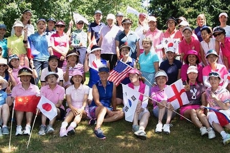 group photo of female golfers