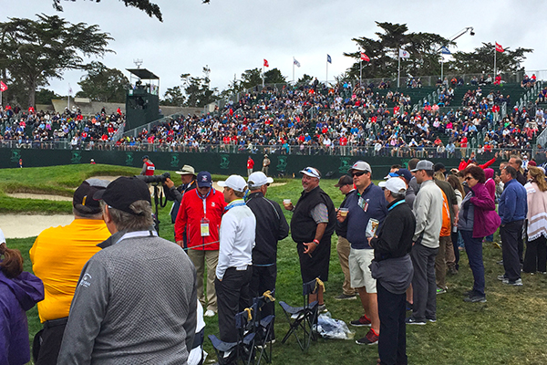 Fans pack the grandstands on the 18th hole at Pebble Beach