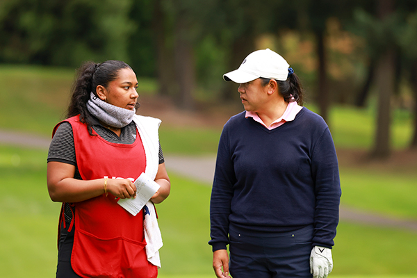 Kim Shek and Adithi Anand – player-caddie on course at U.S. Senior Women’s Amateur