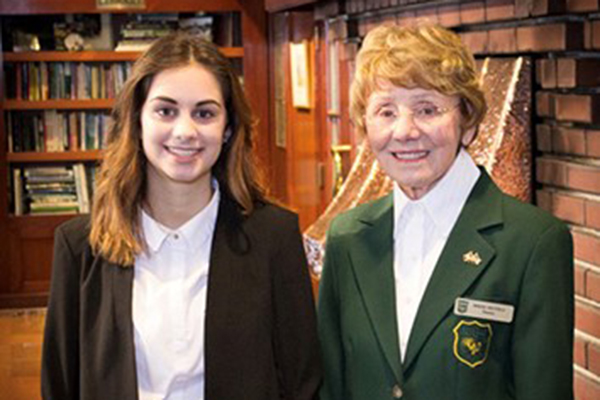 Evans Scholar Angela Bowers (left) with Victoria GC member Berne Neufeld