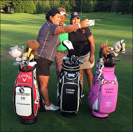 LPGA Tour player Christina Kim (left) takes a selfie of herself, Sadena Parks and Lizette Salas (left to right) on the range at Sahalee after giving a clinic for the guests of the Kick-Off media event. 