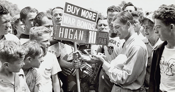 Ben Hogan signs autographs during the 1942 Hale America Open in Chicago, an event that raised money for the war effort. (Photo courtesy USGA)