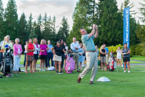 A hands-on guy, Mike Whan shows his game by hitting a shot during a contest at the range at Sahalee Country Club prior to the 2016 KPMG Women’s PGA Championship. (Photo by Rob Perry)